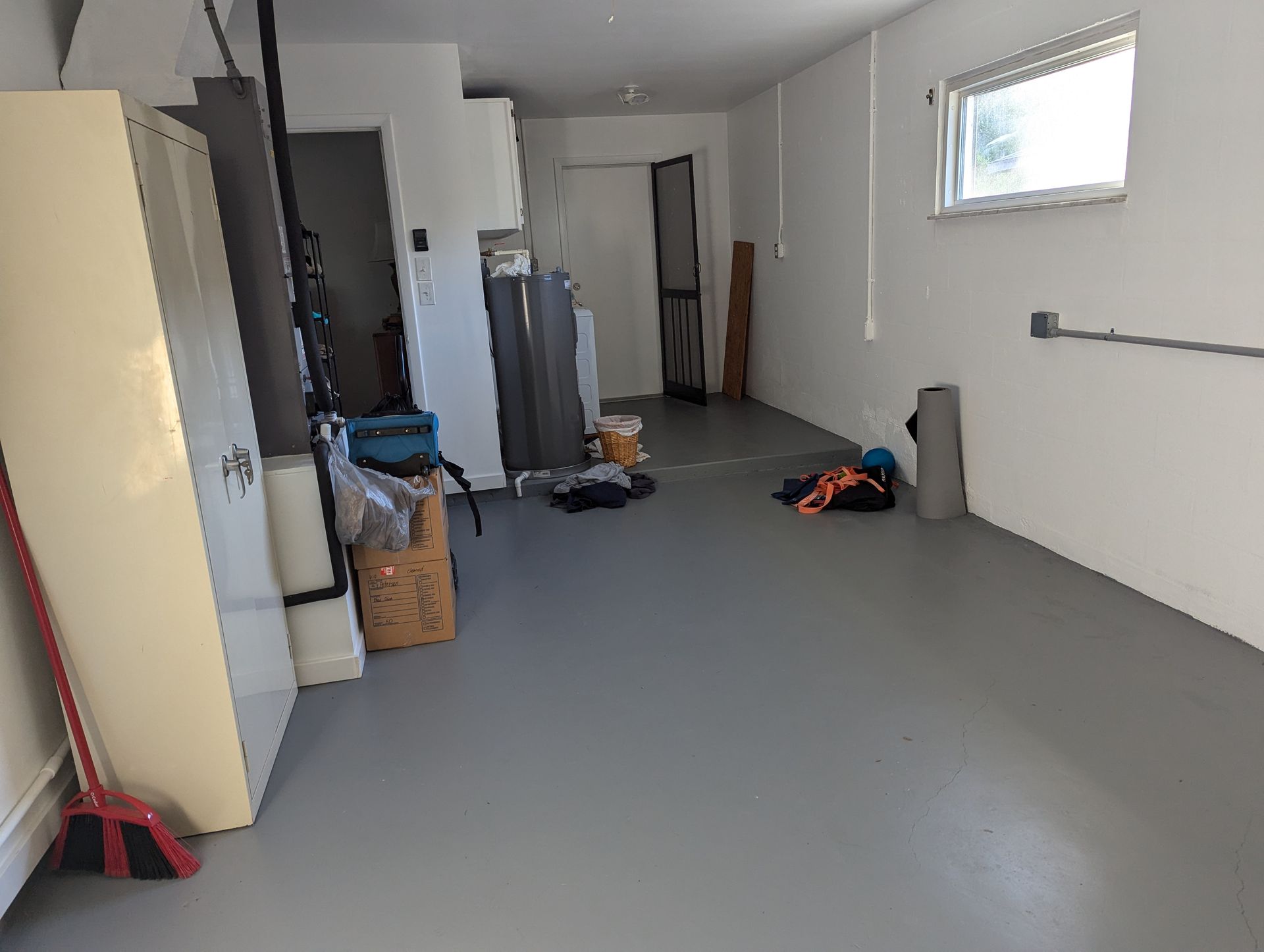 There is a broom in the middle of the room.