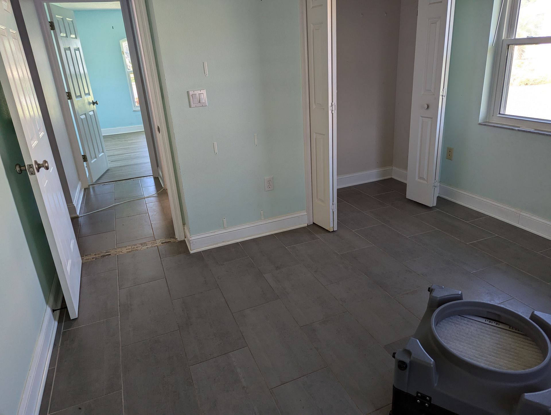 There is a toilet in the middle of the room.