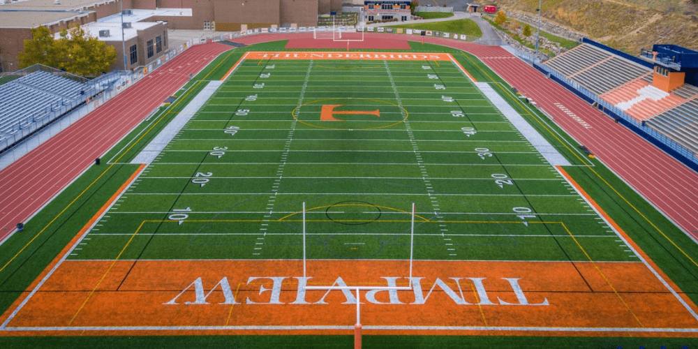 An aerial view of a football field with the word timeview written on it