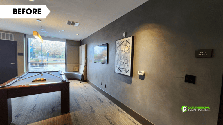 There is a pool table in the middle of the room.