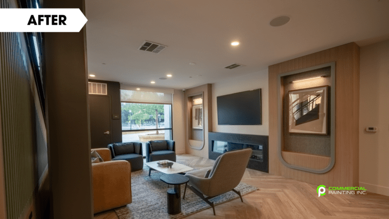 A living room with a fireplace , chairs , coffee table and television.