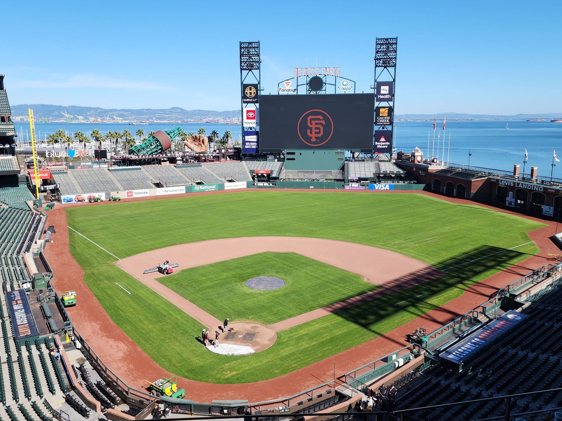 Blue Moon branded shipping container bar at Oracle Park San Francisco industrial navy paint