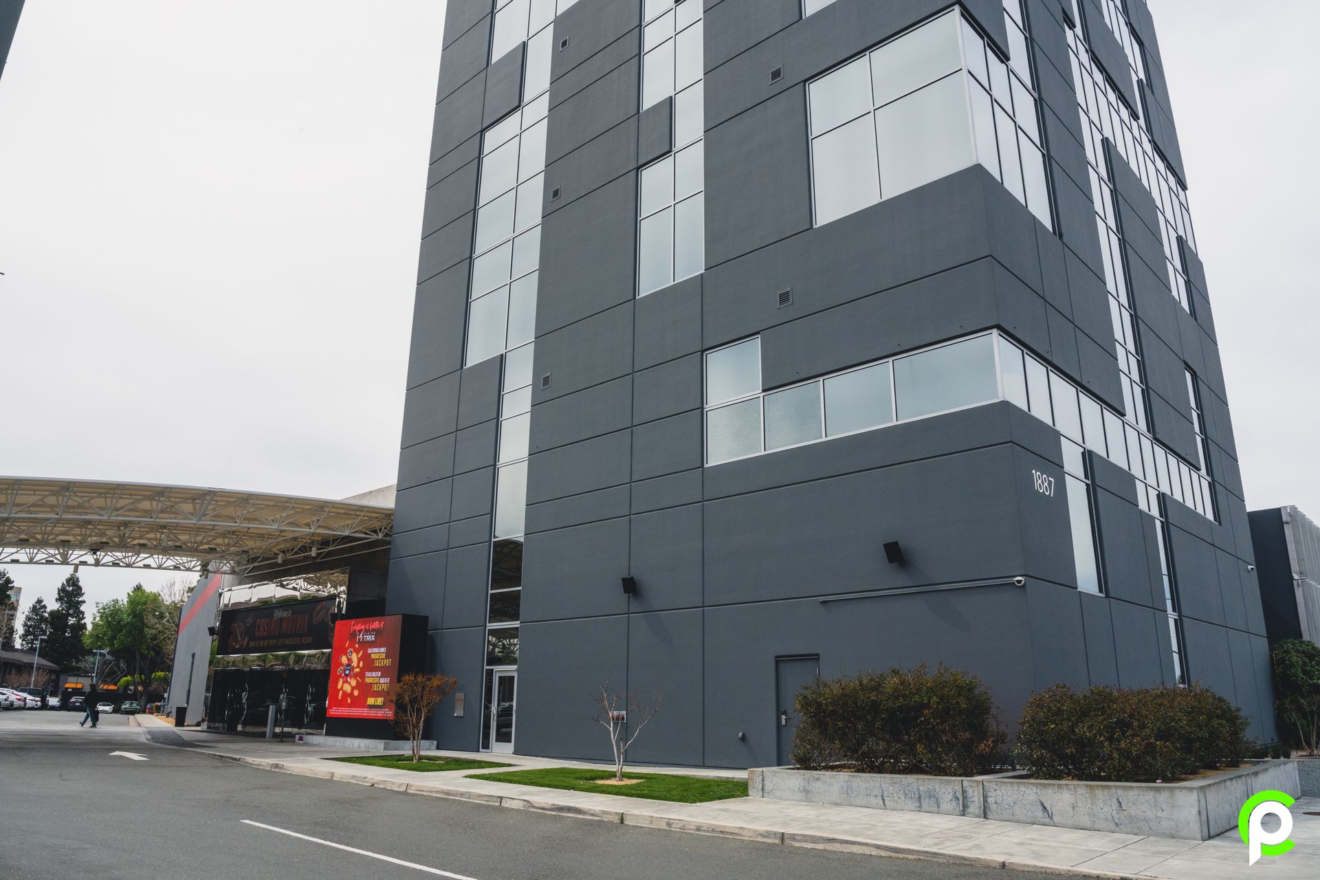 A large building with a cross on the side of it