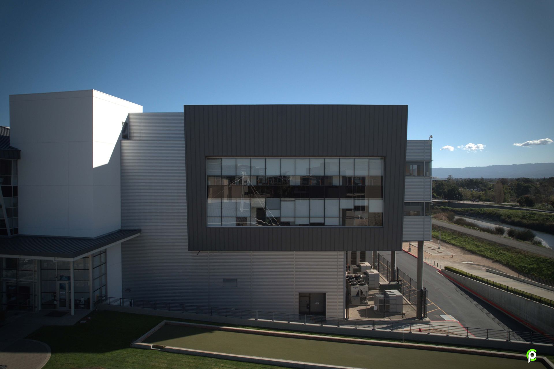 An aerial view of a large building with a lot of windows