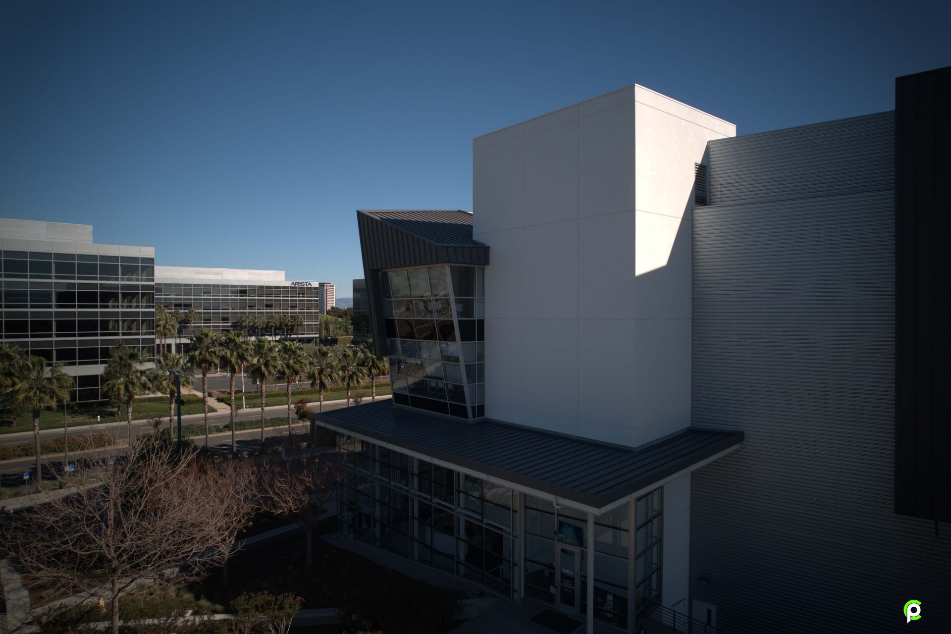 An aerial view of a large building with a lot of windows