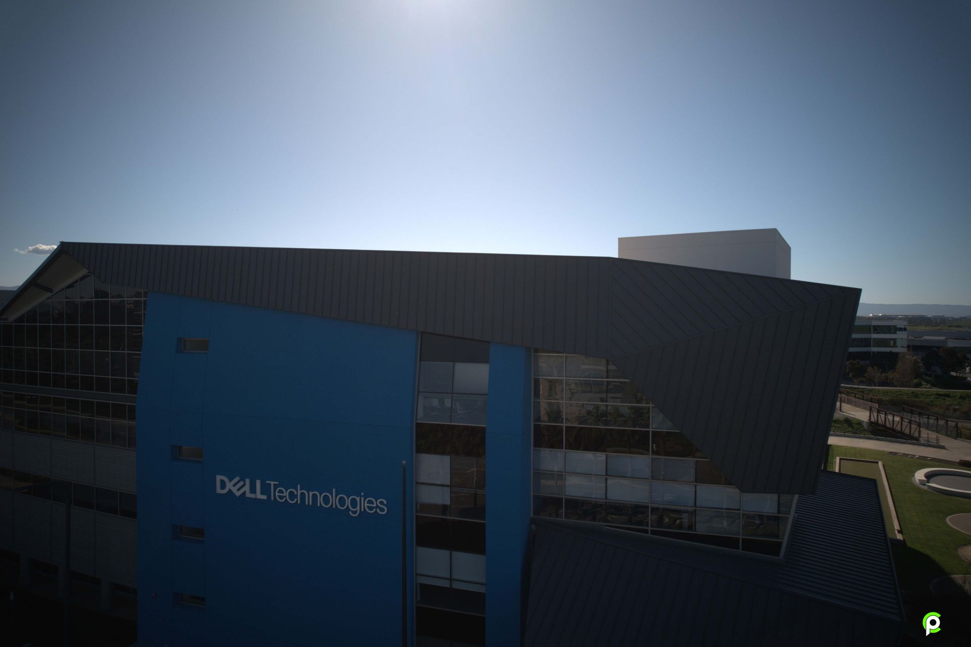 An aerial view of a dell technologies building on a sunny day.