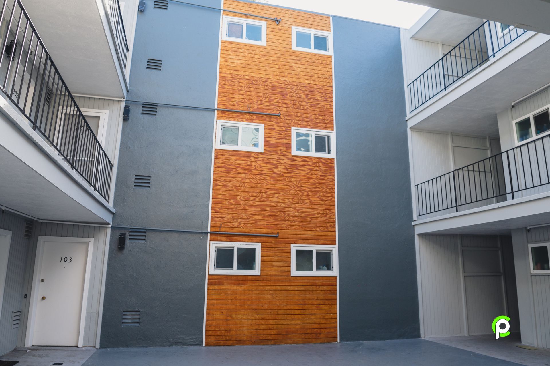 A building with a lot of windows and balconies