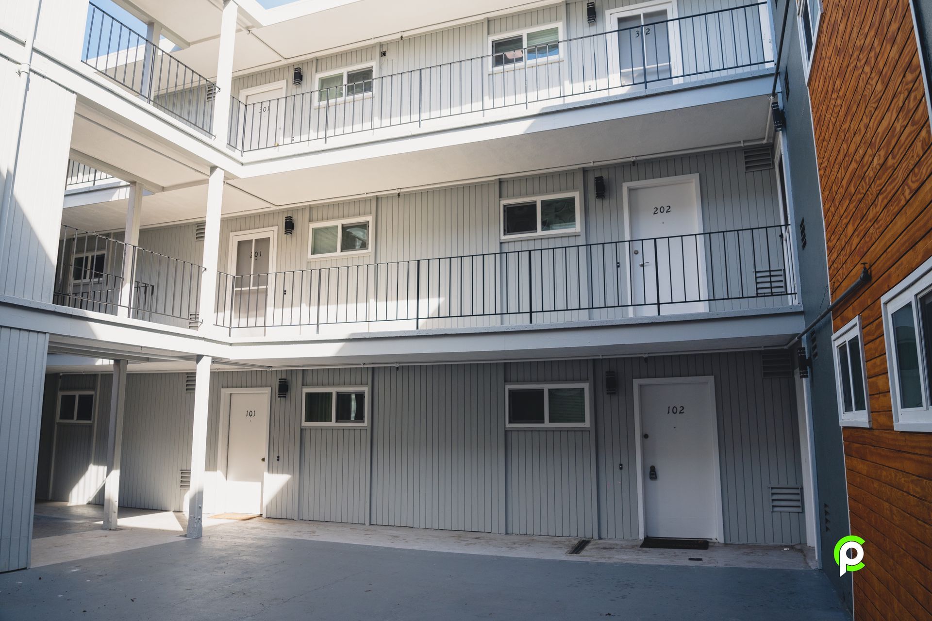 A large building with a lot of windows and balconies