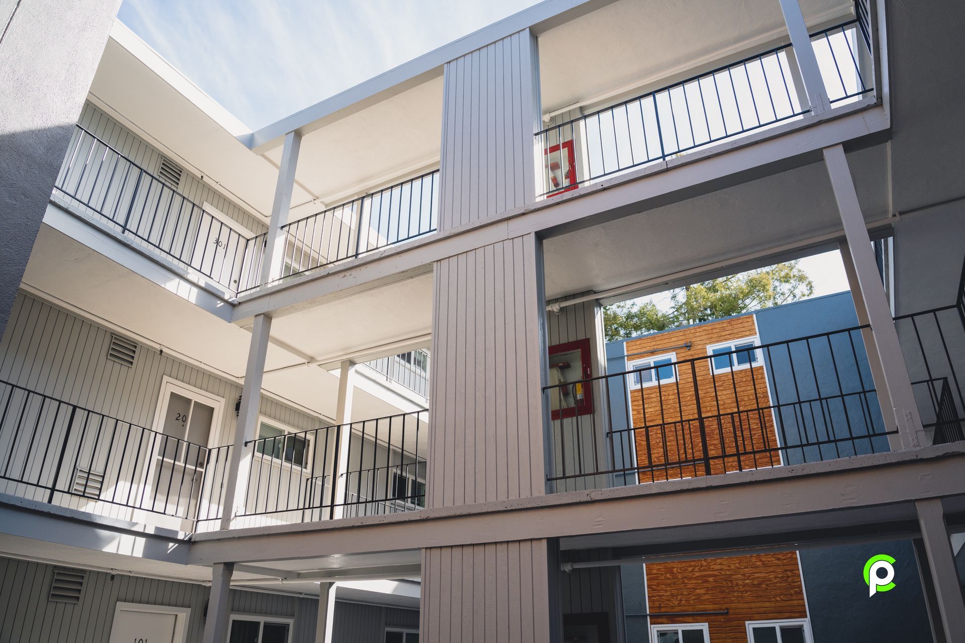 A building with a lot of balconies and windows