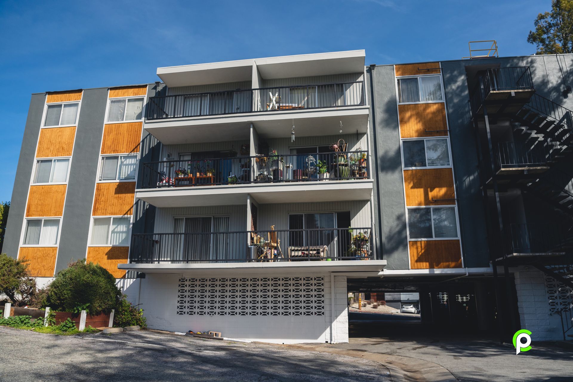 A large apartment building with a fire escape on the side