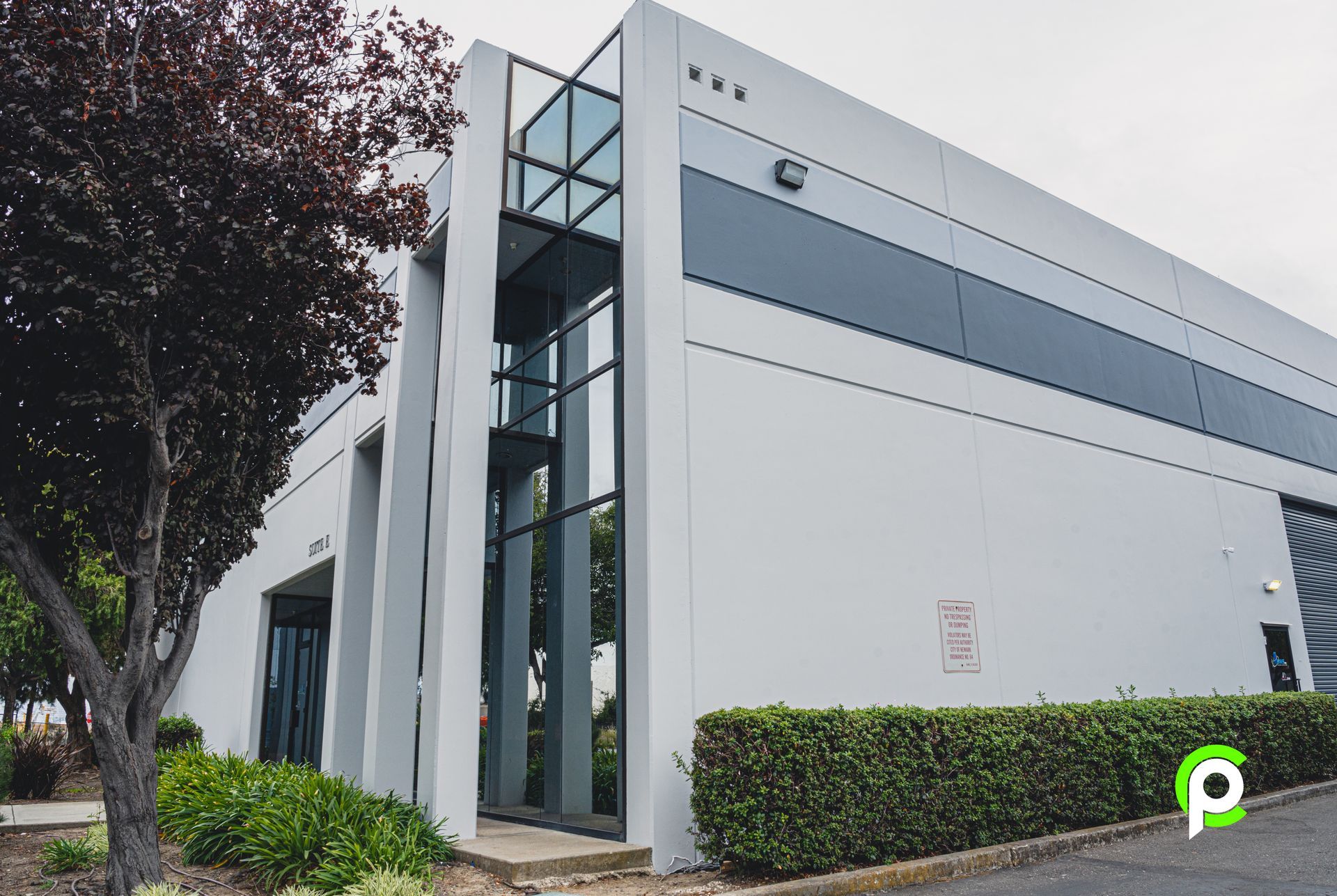 A large building with a lot of doors on it