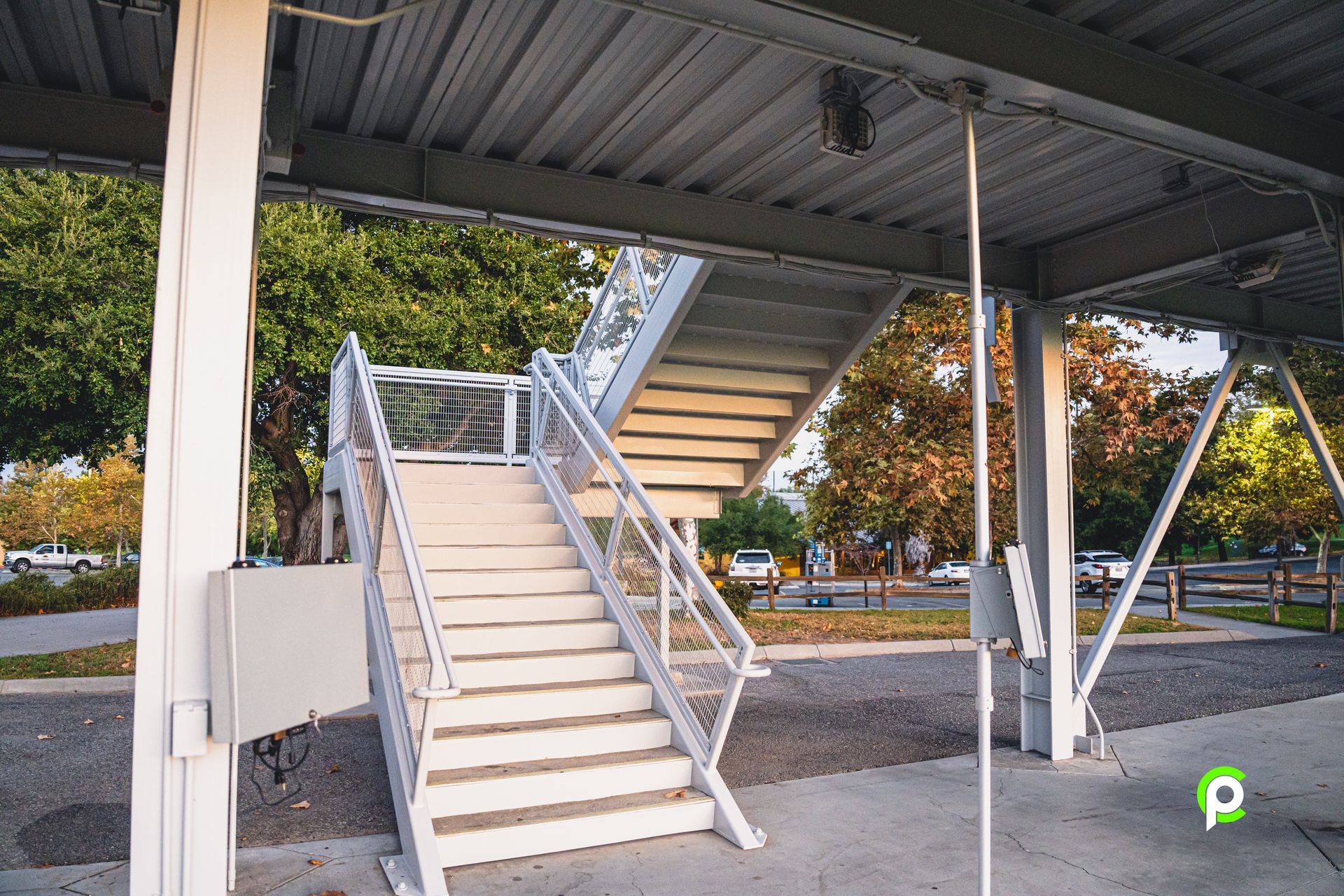 A set of stairs leading up to a covered walkway