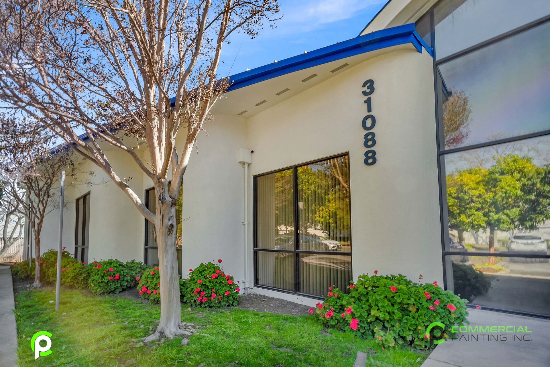 A white building with the number 31088 on the side of it.
