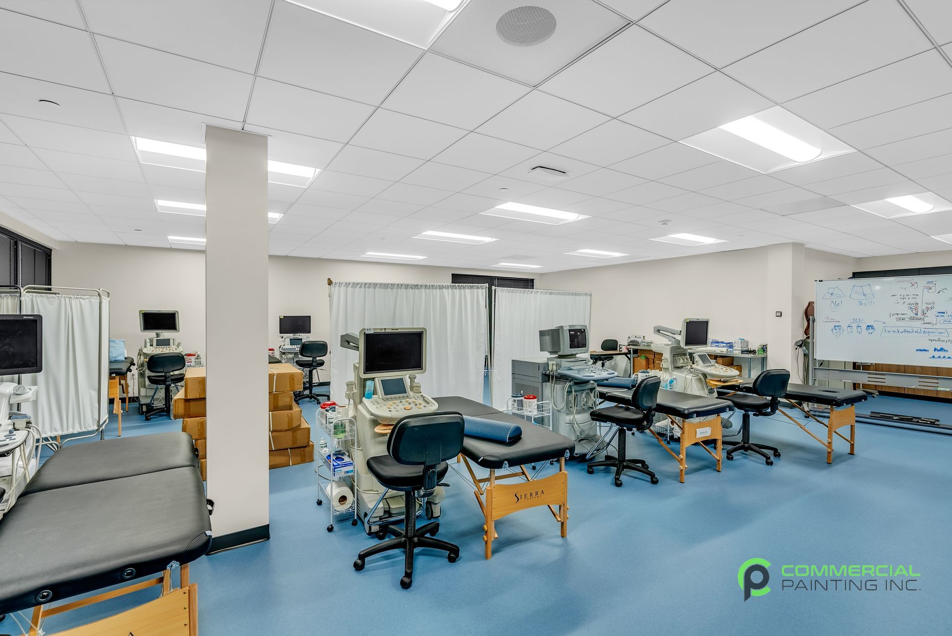 A large room with a lot of medical equipment in it