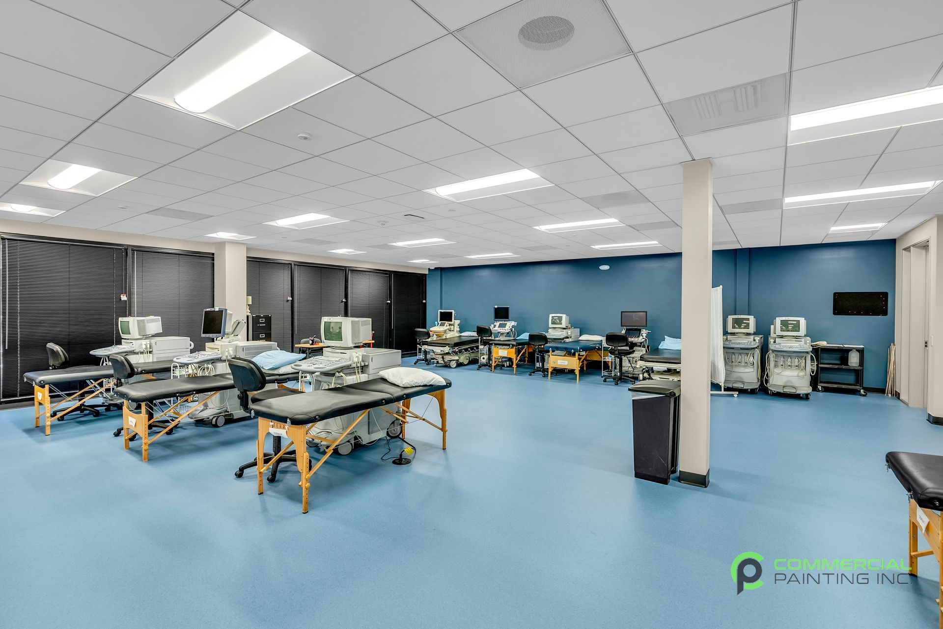 A large room with a lot of tables and chairs