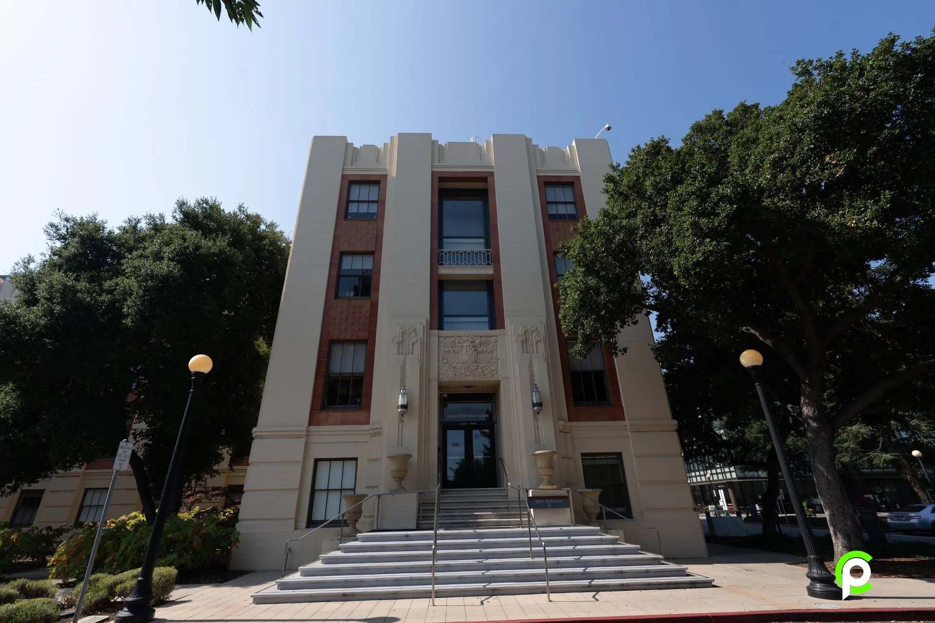 A large building with stairs leading up to it