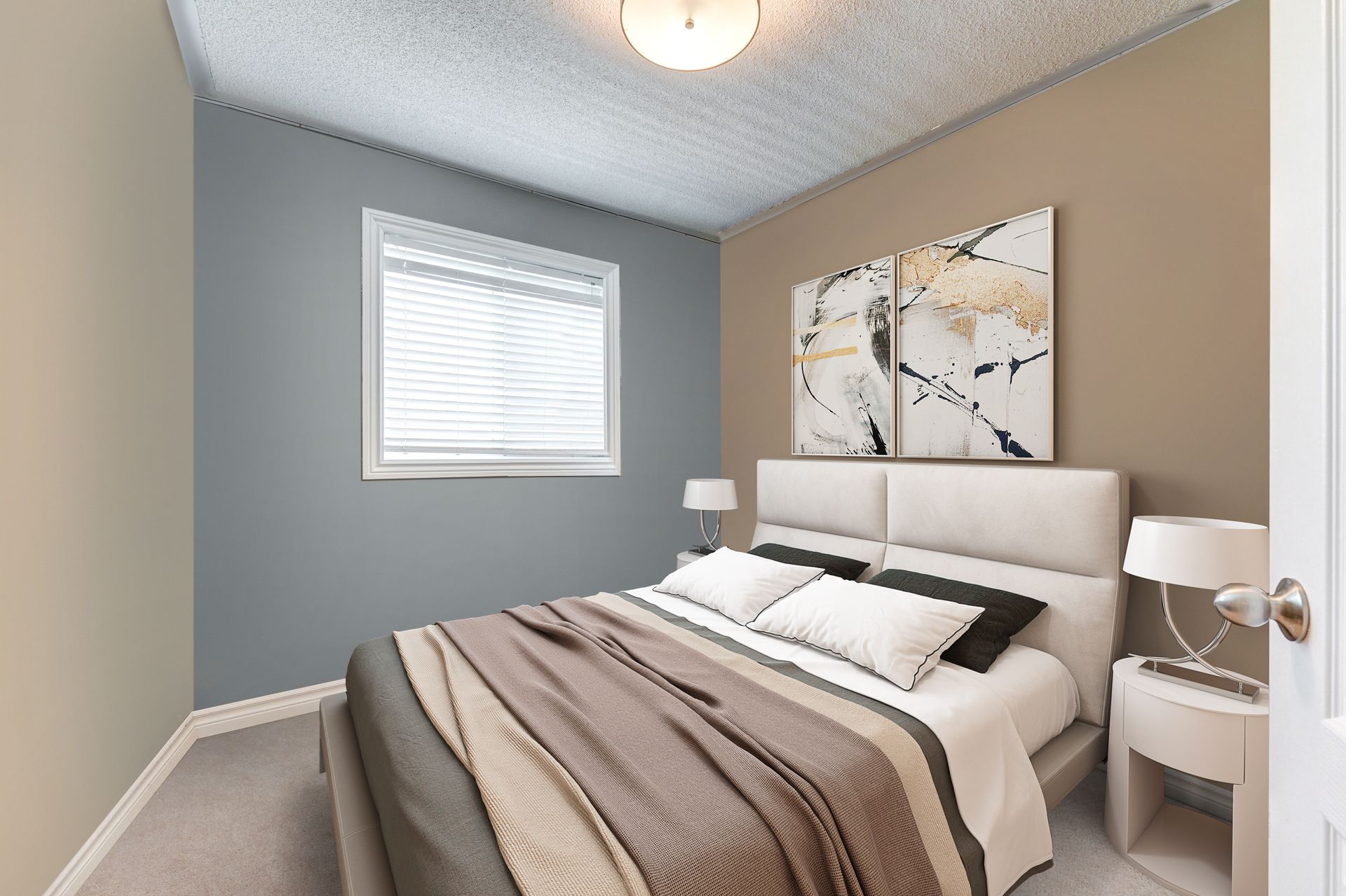 A bedroom with a large bed and a window