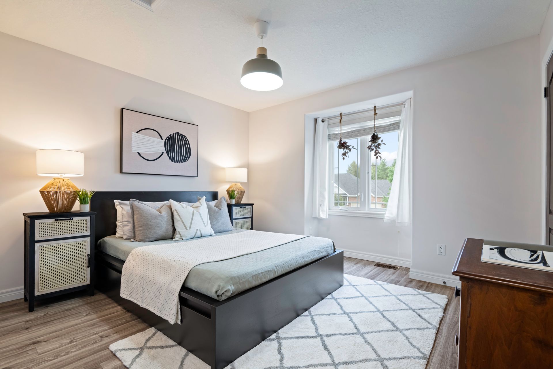 There is a large bed in the middle of the room.