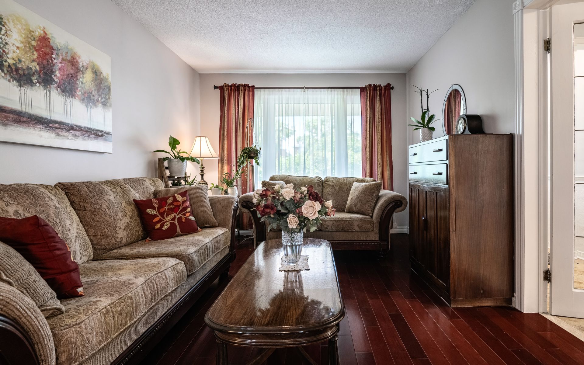 a living room with two couches and a coffee table