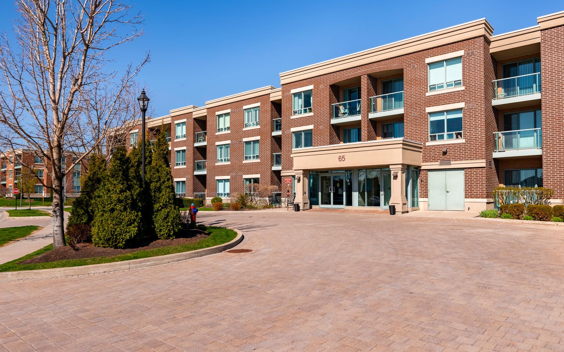 A large brick building with lots of windows and balconies