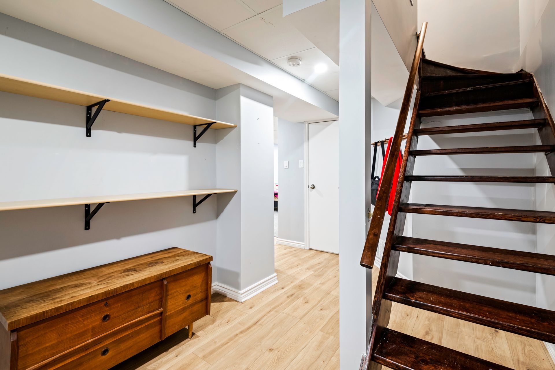 A wooden staircase leading up to the second floor of a house.