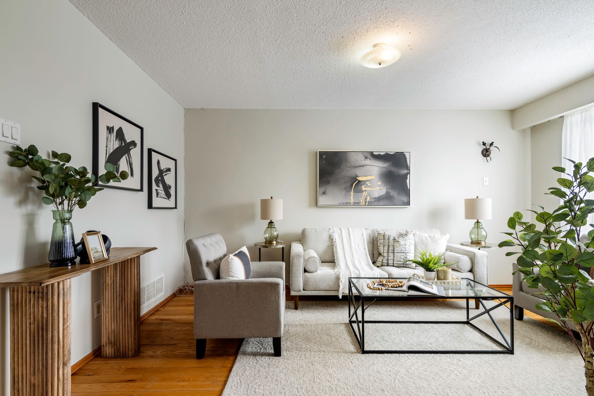 A living room filled with furniture and a coffee table.