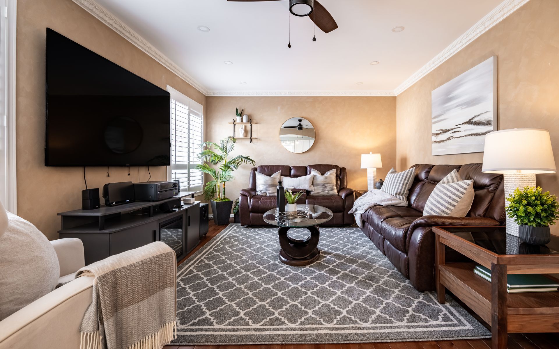 A living room filled with furniture and a flat screen tv.