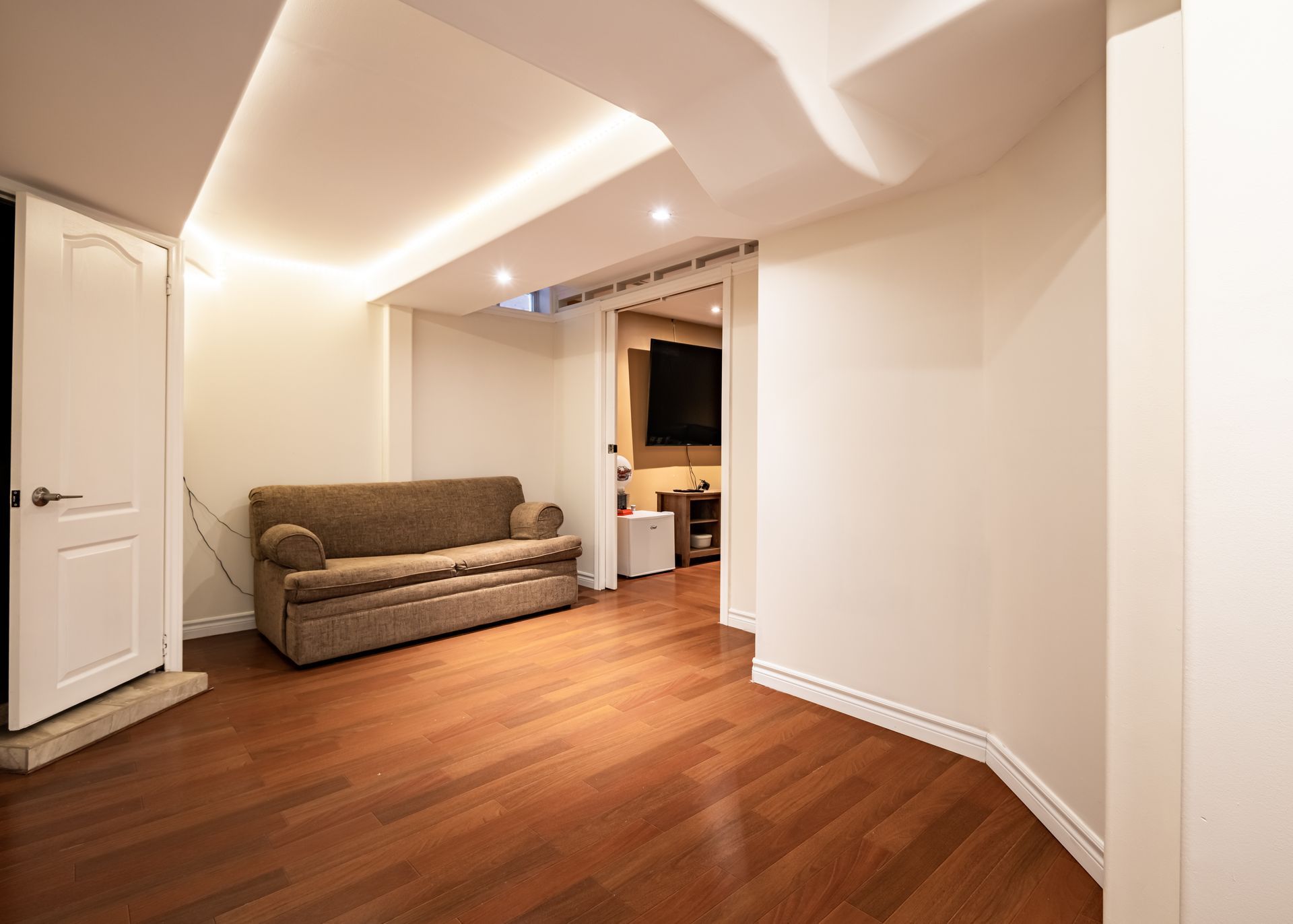 There is a couch in the middle of the room.