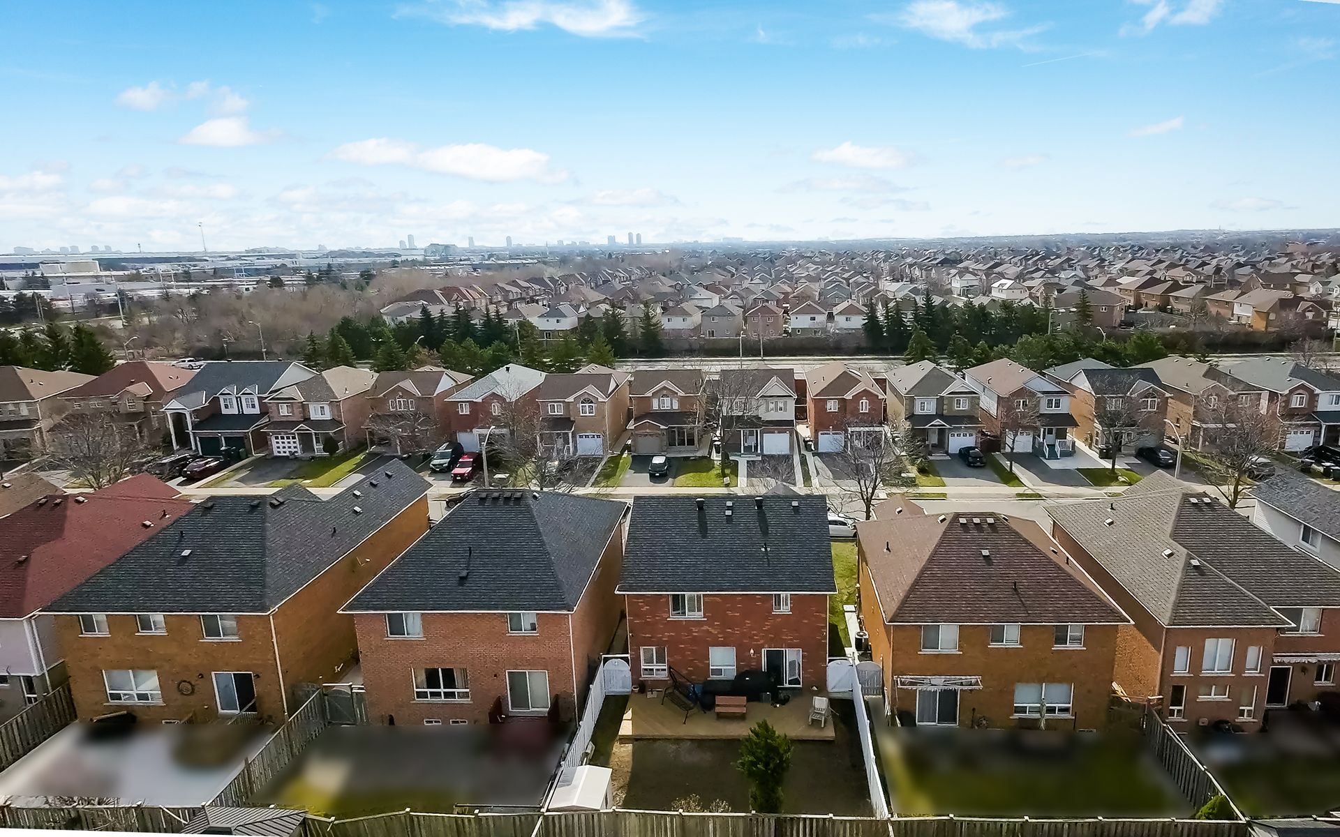 An aerial view of a residential area with lots of houses
