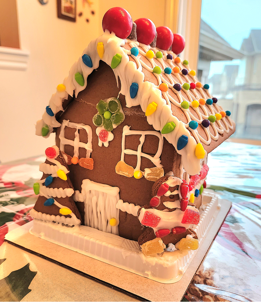 A gingerbread house sitting on top of a table