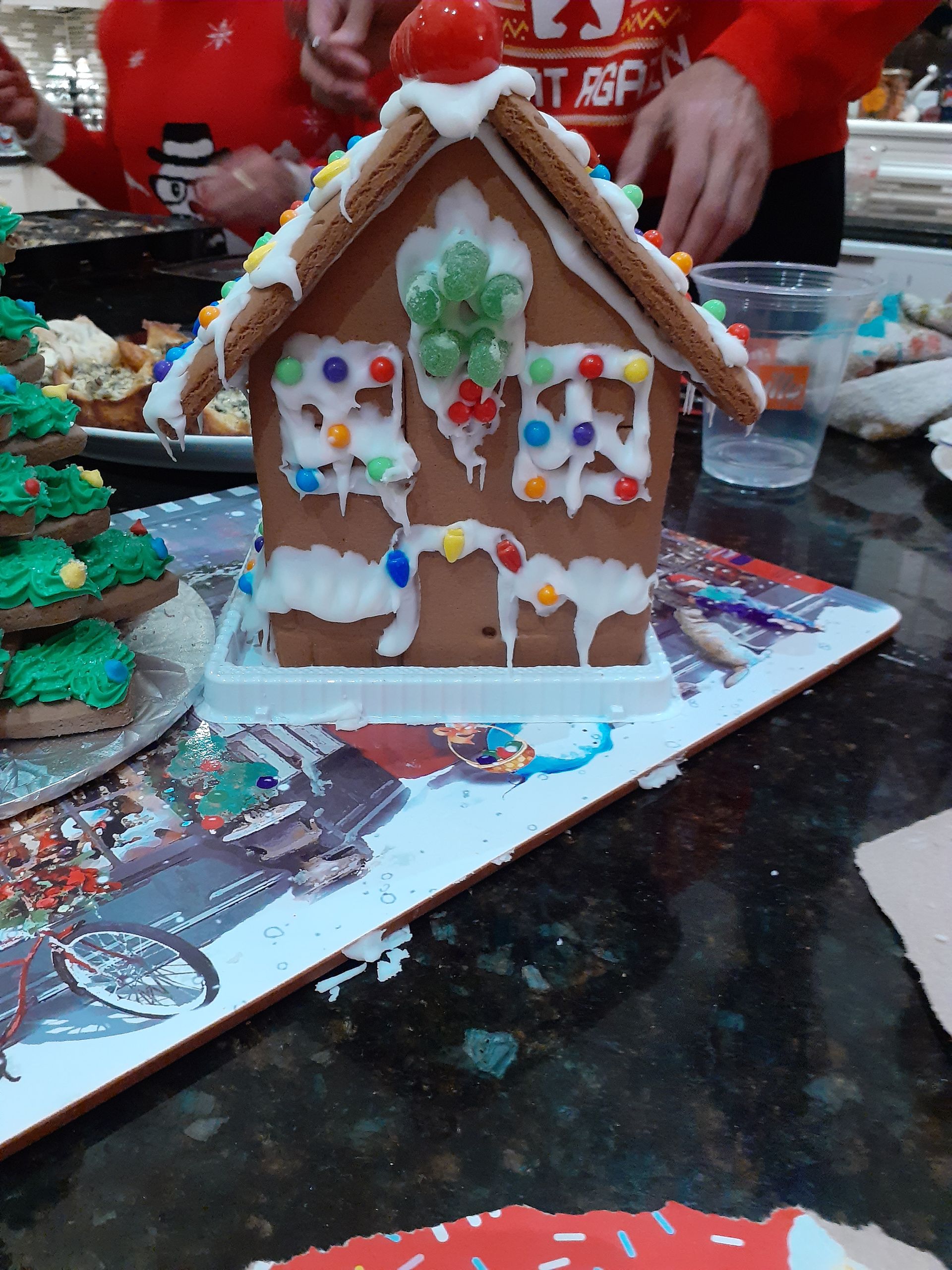 A gingerbread house sitting on top of a table