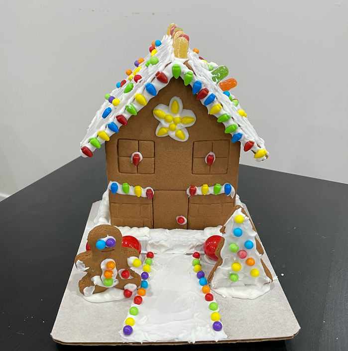 A gingerbread house sitting on top of a table