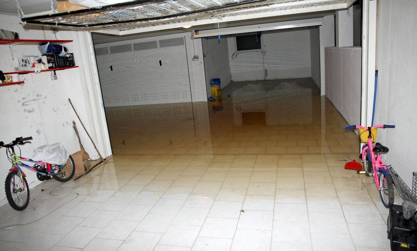 Basement Garage with High Water Flooded — Benton, KY — Premier Disaster Restoration
