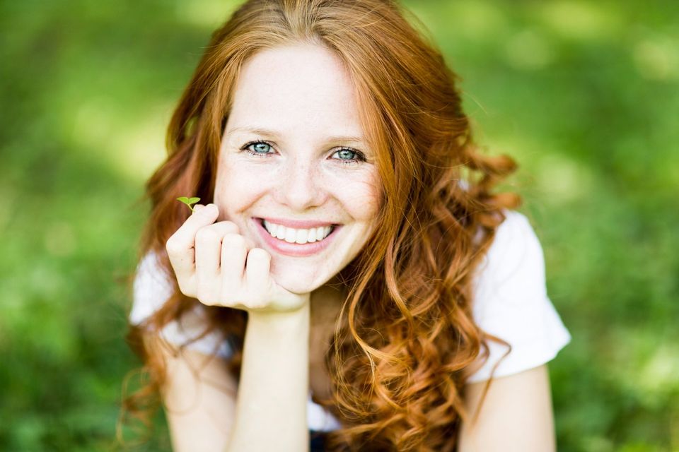 Woman Sitting on the Grass — Park City, IL — The Woods Women’s Group