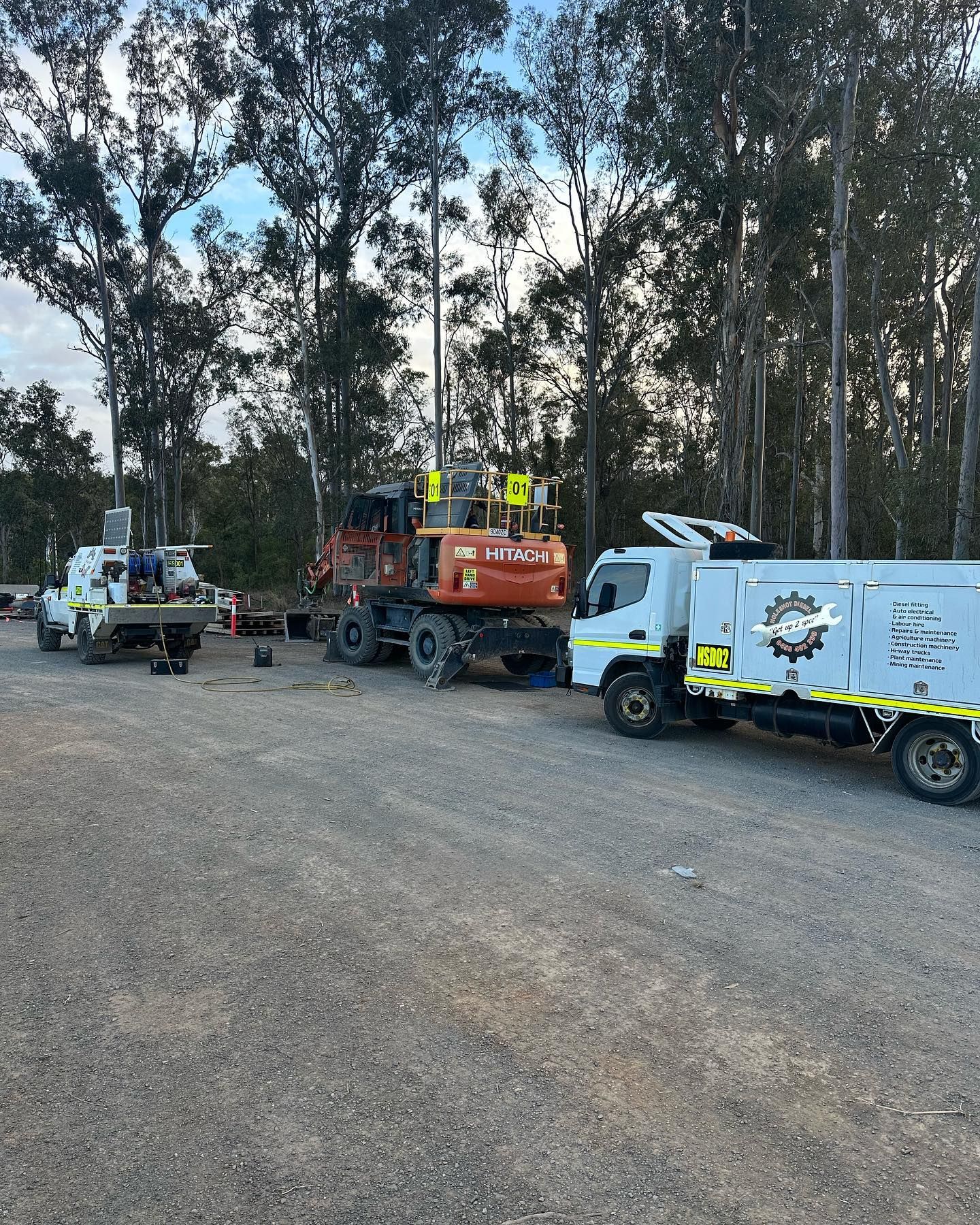 Construction Site: Excavator, Trucks, and Workers — HOLESHOT Diesel In Blackwater, QLD
