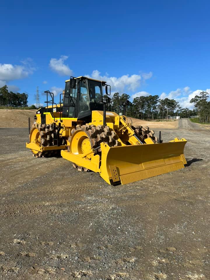 Yellow Construction Compactor Machine With Blade — HOLESHOT Diesel In Sunshine Coast, QLD