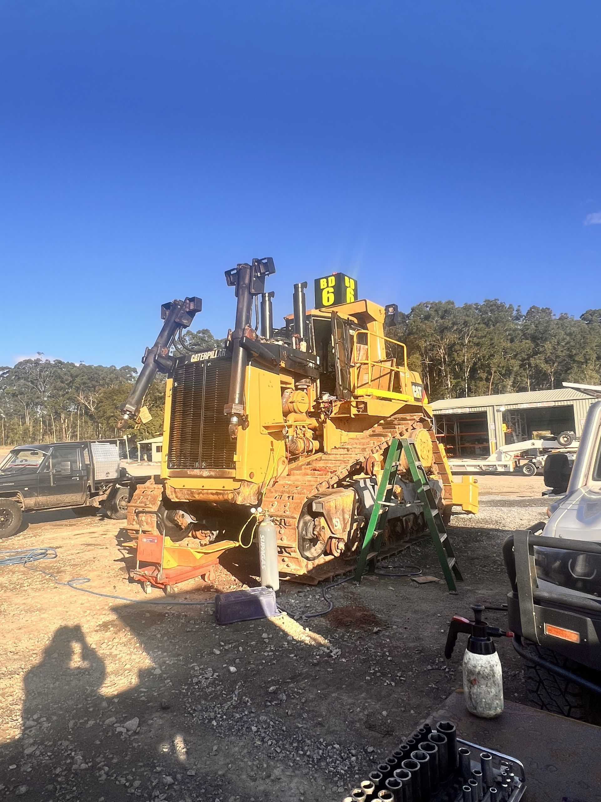 Yellow Bulldozer in Outdoor Setting — HOLESHOT Diesel In Kingaroy, QLD