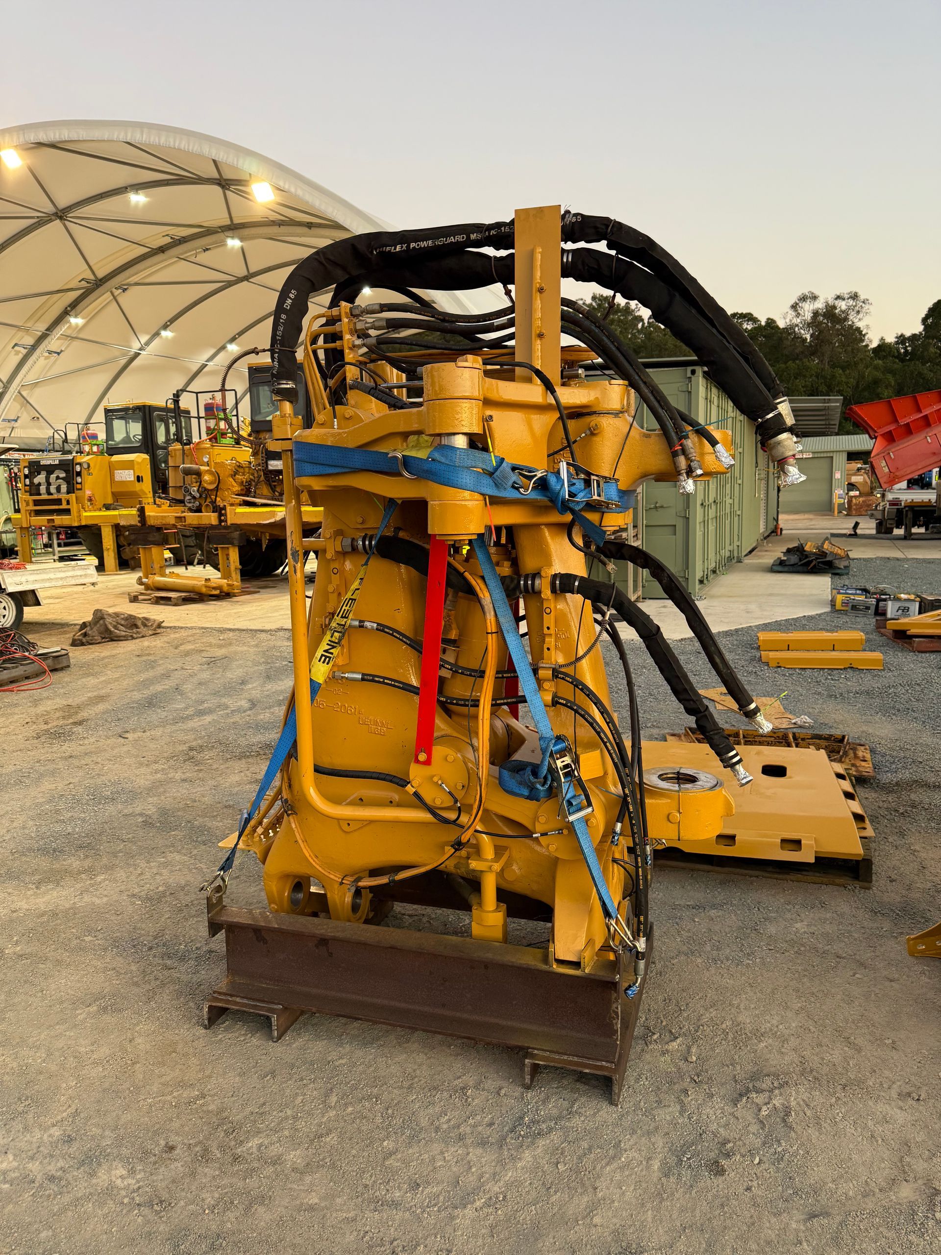 Yellow Industrial Machine With Black Hoses, Outdoors on Grave — HOLESHOT Diesel In Toowoomba, QLD