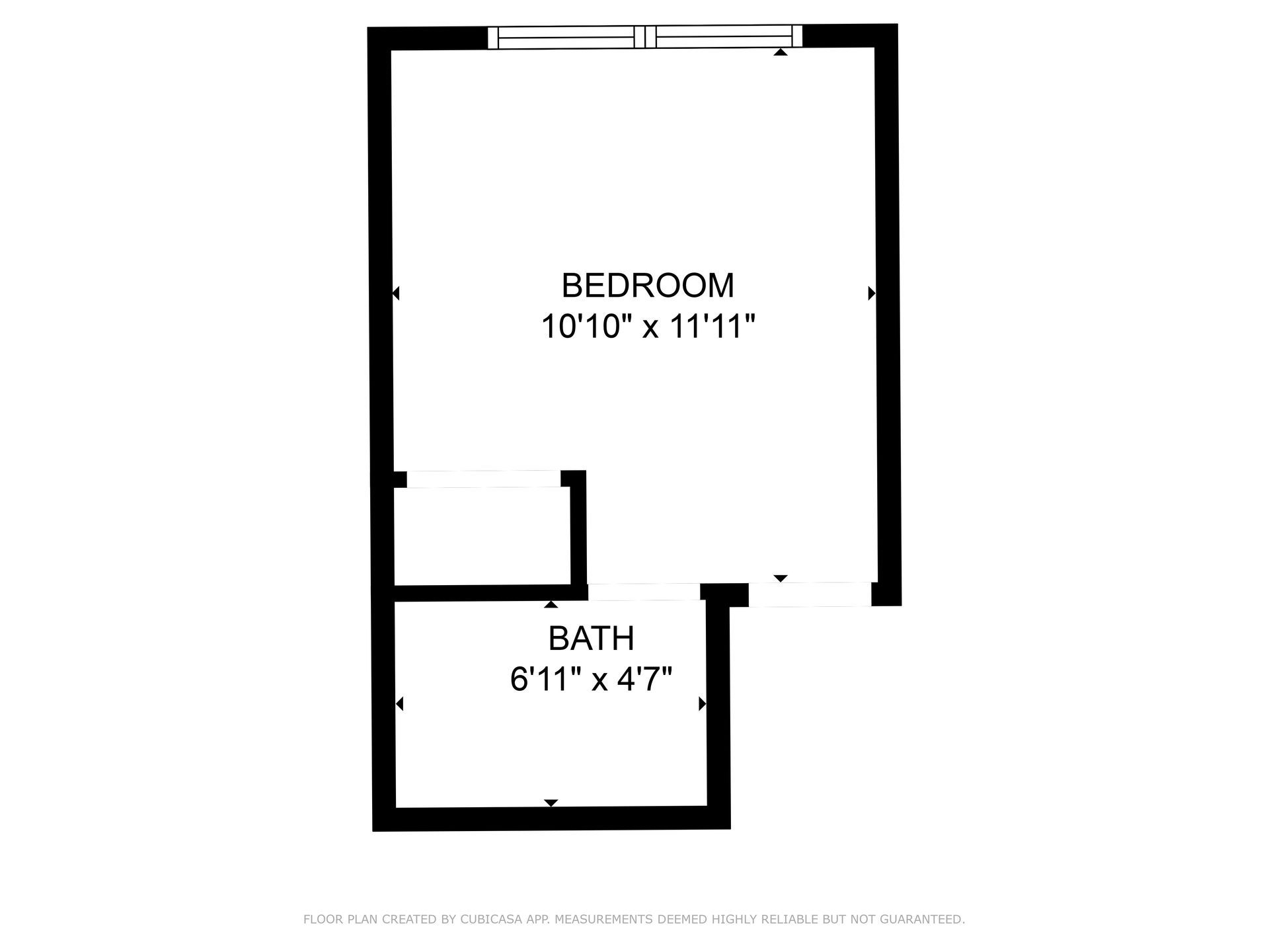 A black and white floor plan of a bedroom and bathroom.