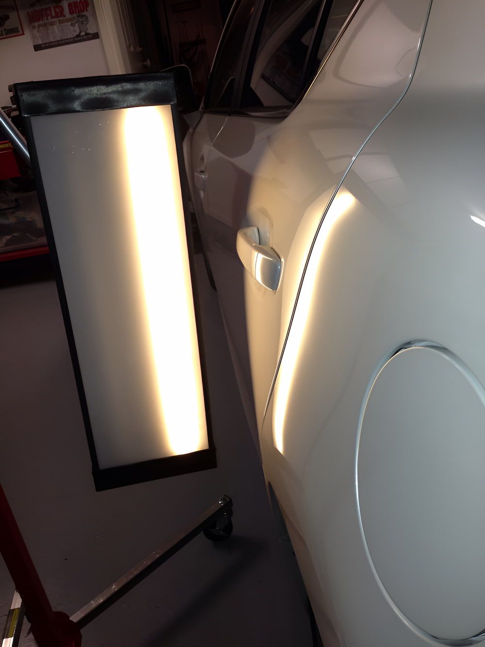 A White Car With A Light On The Side Of It — Rapid Auto Dent In West Gosford, NSW