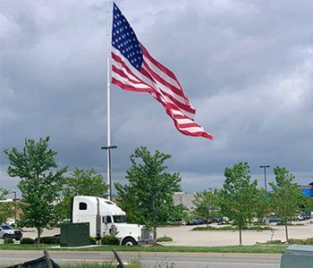 Truckers — Trucking Location with USA Flag in South Charleston, OH