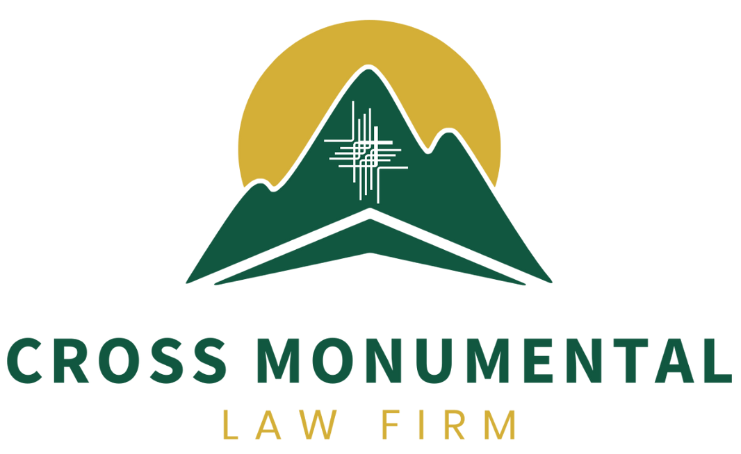 Logo for Cross Monumental Law Firm: Green mountain silhouette with gold sunburst background, white cross design.