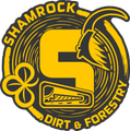 The shamrock dirt and forestry logo is yellow and black