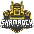 A logo for shamrock trucking and hauling company