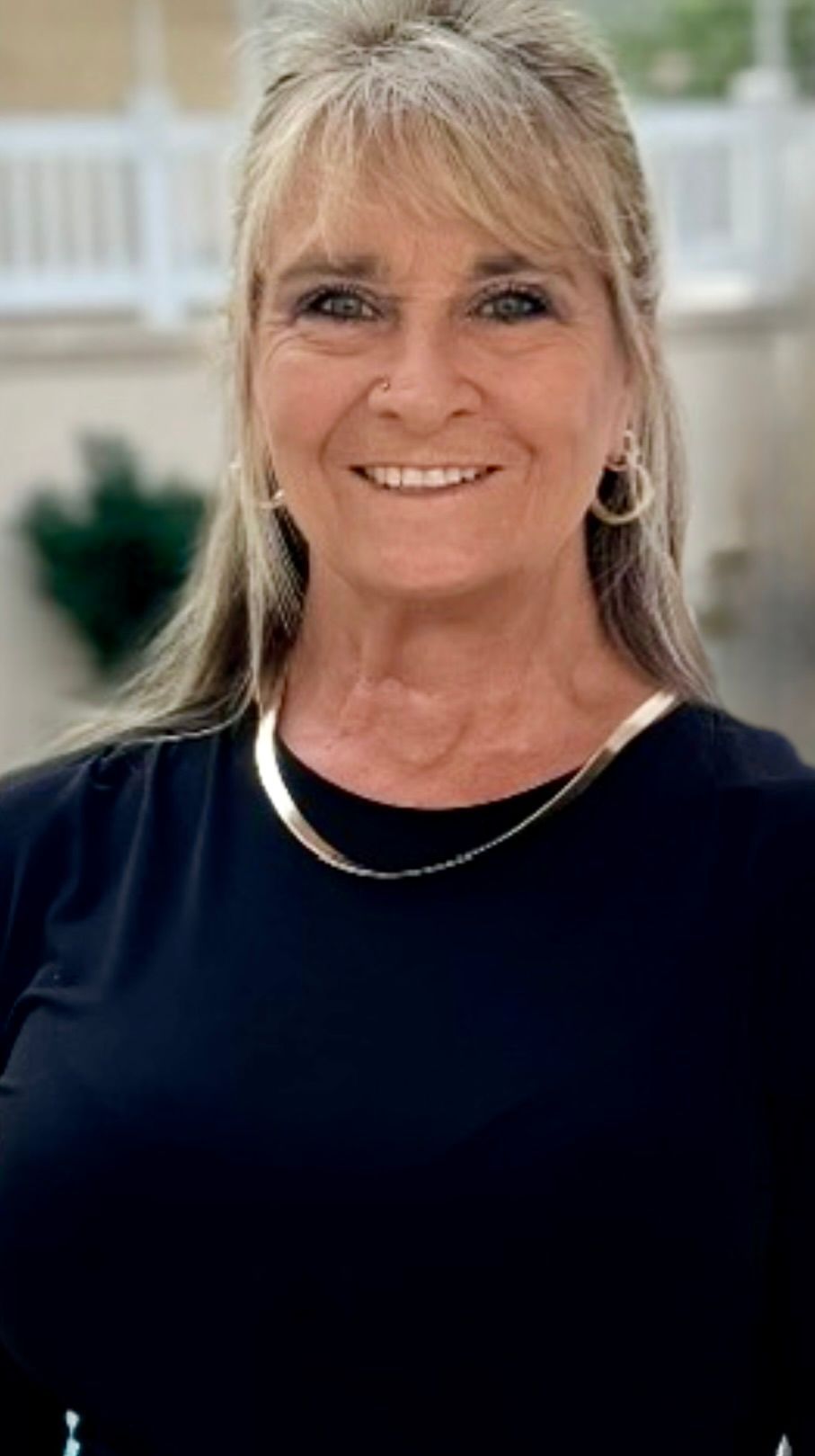 Tamara Williams Tamara Williams, Paralegal at Stokes Law Firm, smiling in a professional black top with gold accessories.