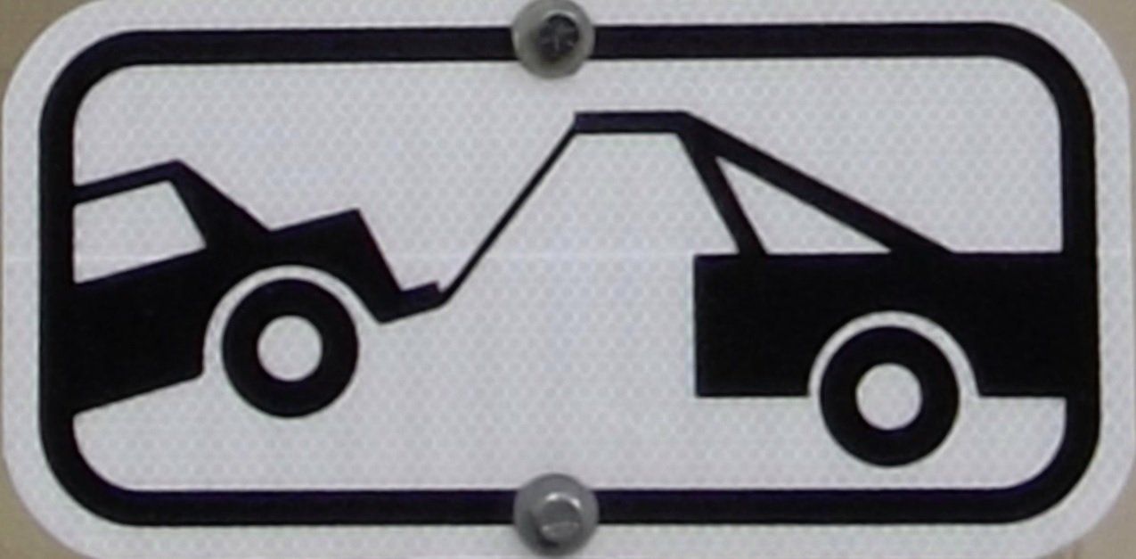 No tow zone road sign