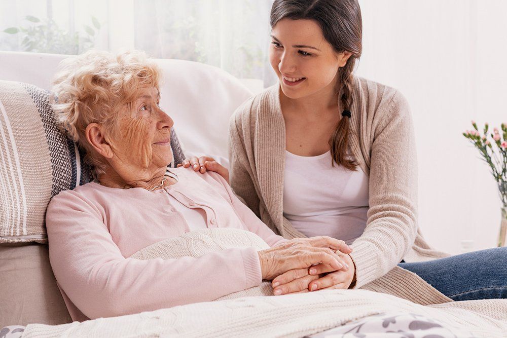 Woman Caregiver and Senior Woman Talking — Love to Care — Valley Stream, NY