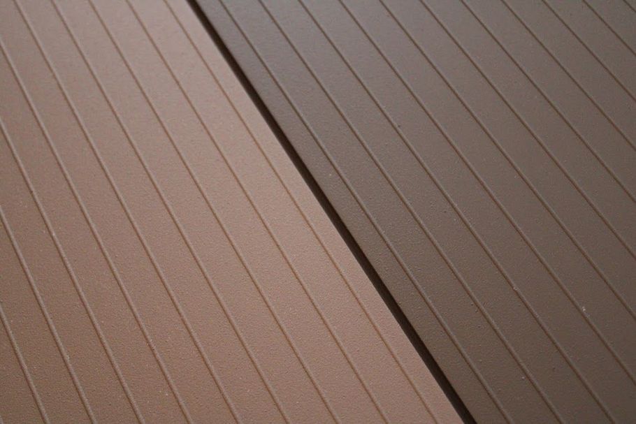 A close up of two different colored wooden boards.