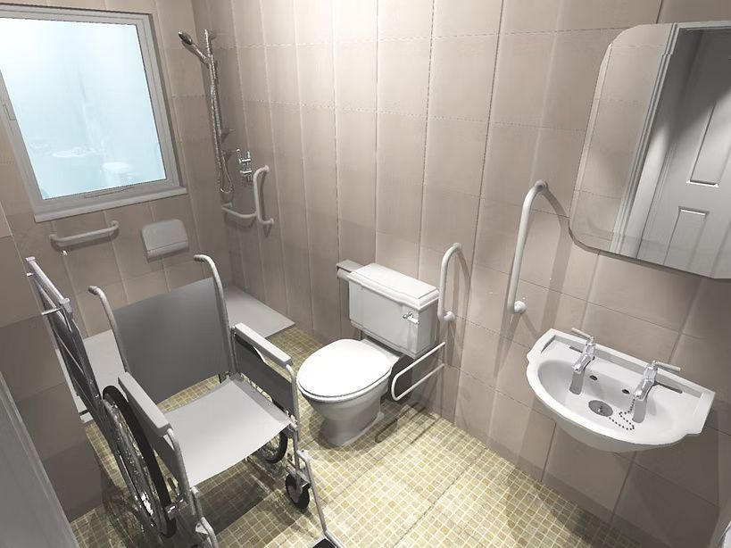 Accessible bathroom with wheelchair, toilet, shower, and sink. Beige tile walls, window, grab bars.