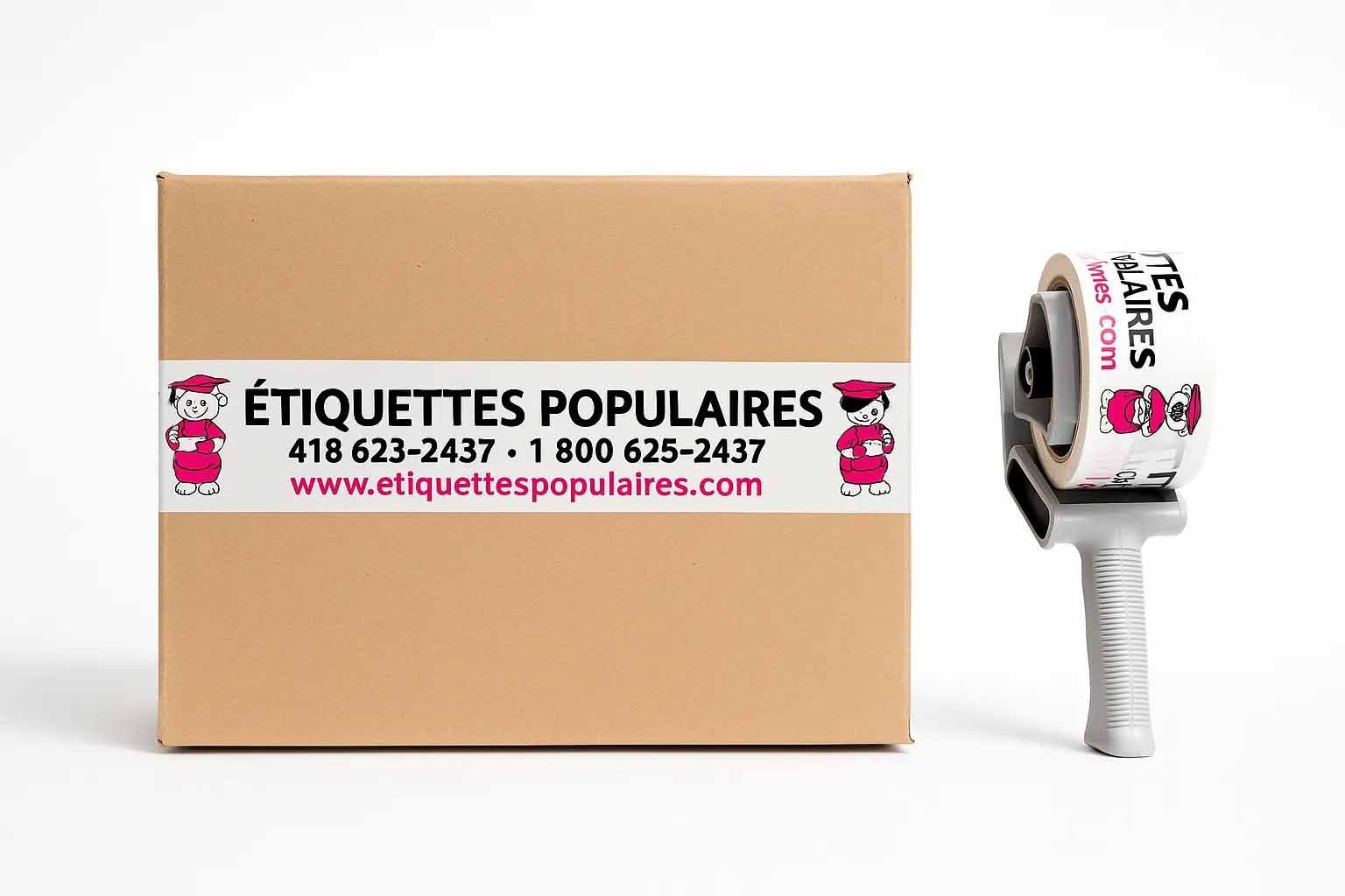 Boîte en carton avec une bande de ruban adhésif blanc portant l'inscription « Étiquettes Populaires » et un dérouleur de ruban adhésif.